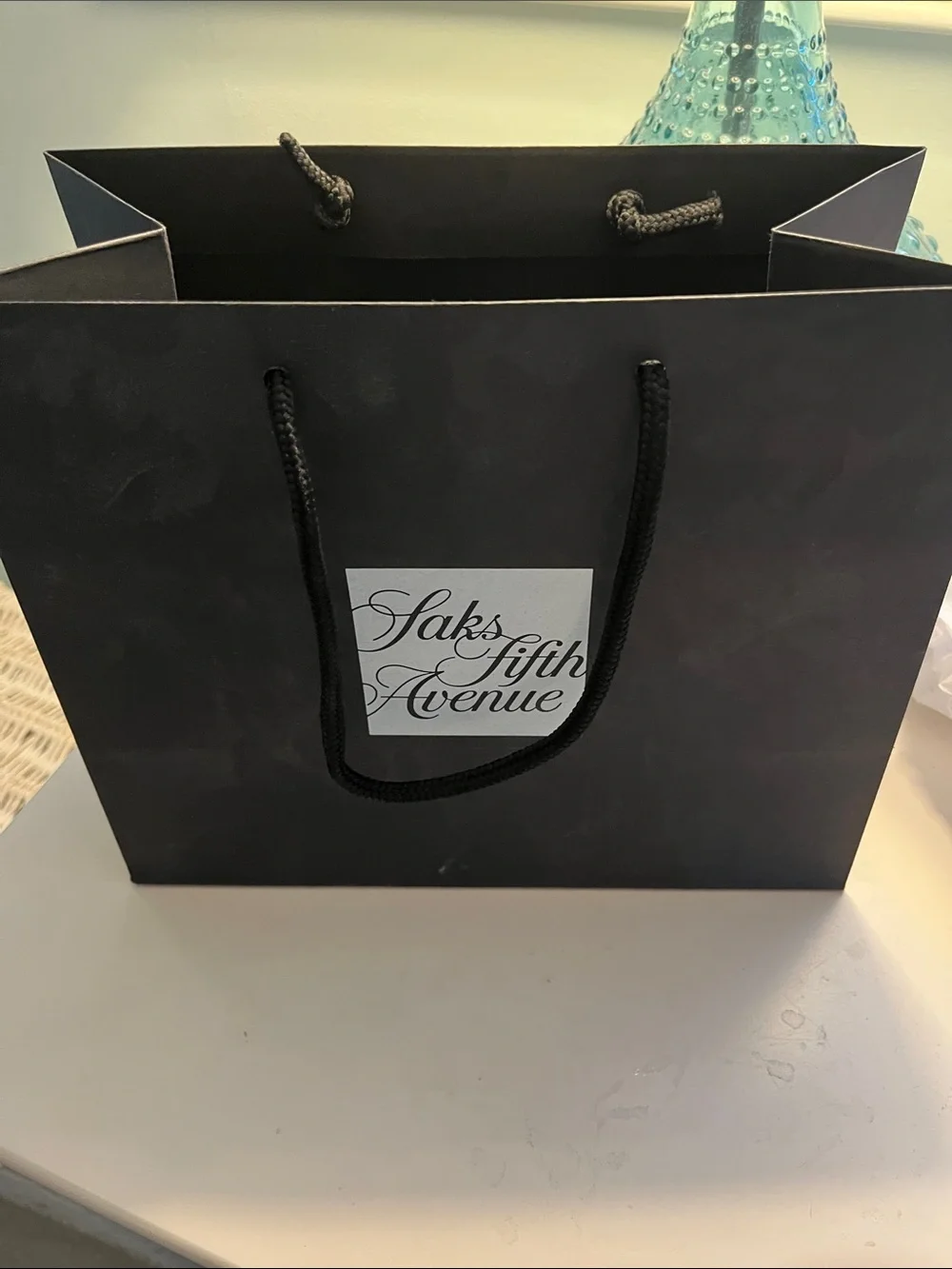 Vintage Gucci cloth cosmetic bag and Saks Fifth Ave  shopping bag